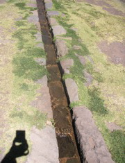 The aqueducts at the Pisac ruins are still functional! I could not get the shadow of my hand and camera out of the picture.