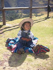 A native baby, expressing much curiousity with our presence.