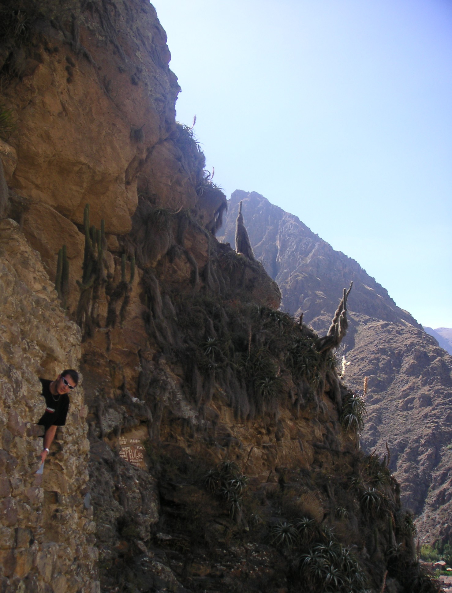 A view of the Ollantaytambo Inca ruins with Michael leaning out the window.