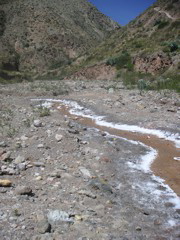 We begin to see salt along a stream near the salt mines of Maras.