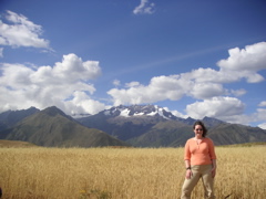 Janet posing in a field. We stopped at the mountain's base for lunch, on the way to Moray.