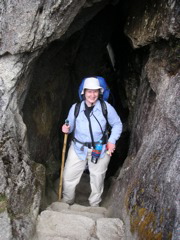 Janet at the entrance of a cave.