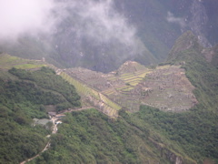 Finally, what everyone has been waiting for! Machu Picchu is seen in the distance, with clouds rolling in.