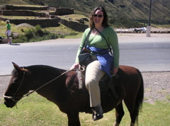 Janet on horseback (Pukapukara in the background).