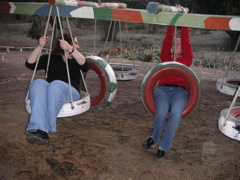 Janet and Jenn on the tire swings at the Hotel-Hacienda Ocucaje.