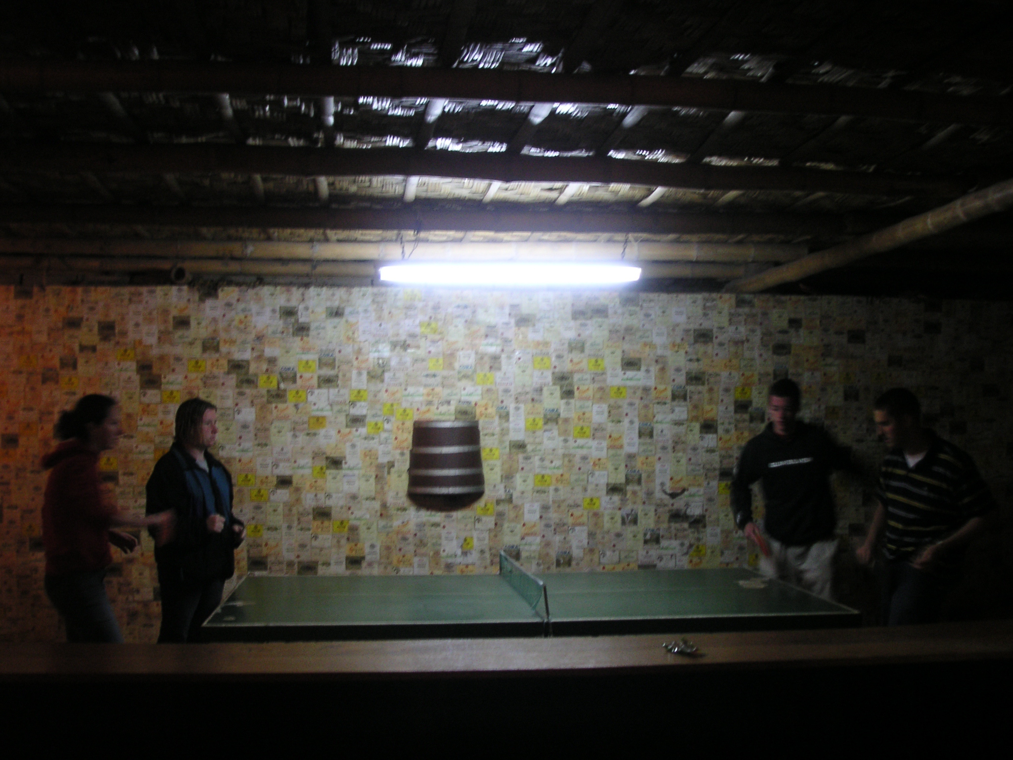 Jenn and Heather vs. John and Joe in the game room at the Hotel-Hacienda Ocucaje, Ica.