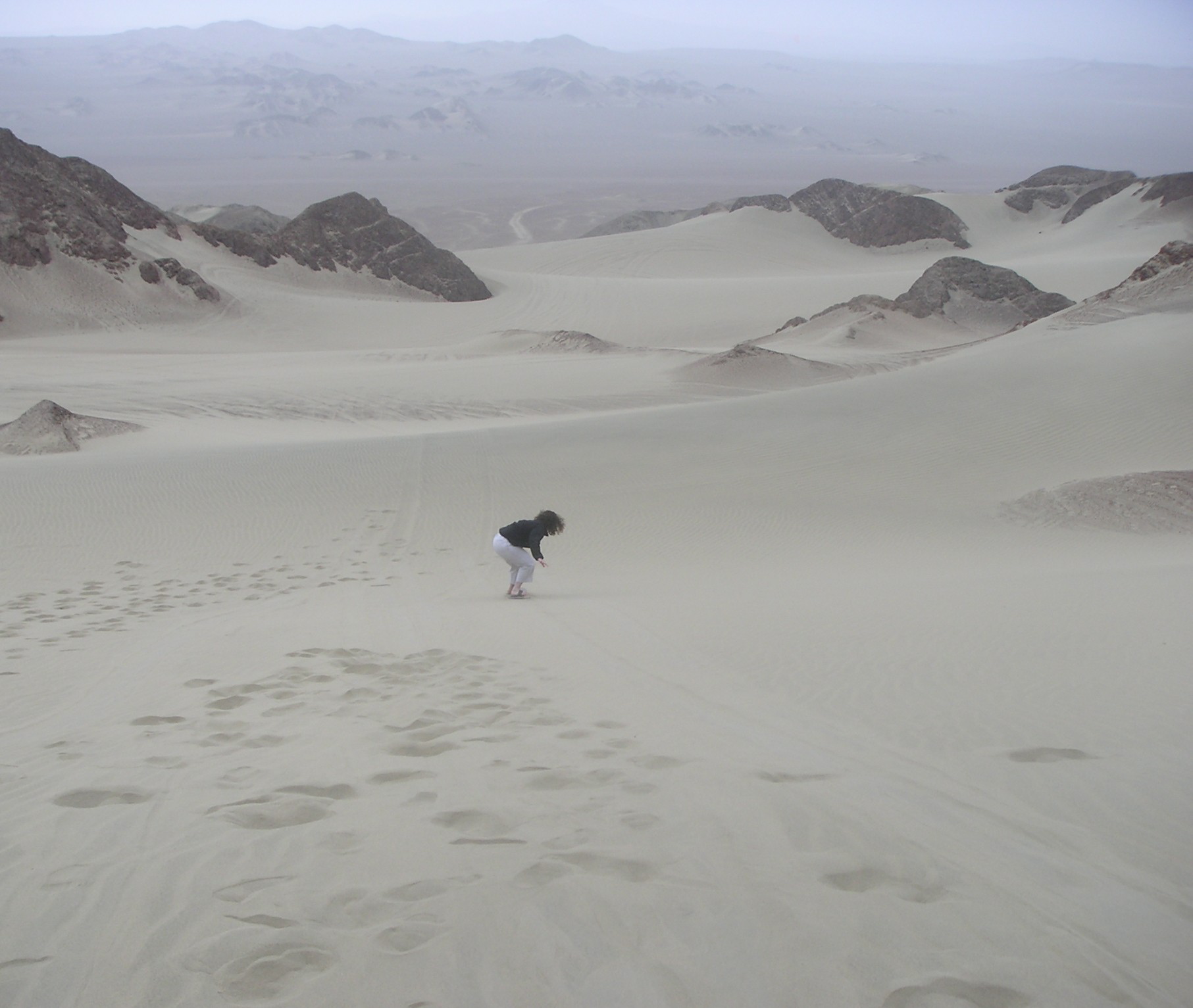 Janet "attempting" sandboarding.