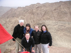 (L to R and front) Megan, olga, Jason, Janet, and Marianne taking a break from the ride.