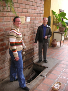 Janet and Jason standing at the doorway to the catacombs, Hotel-Hacienda San José.