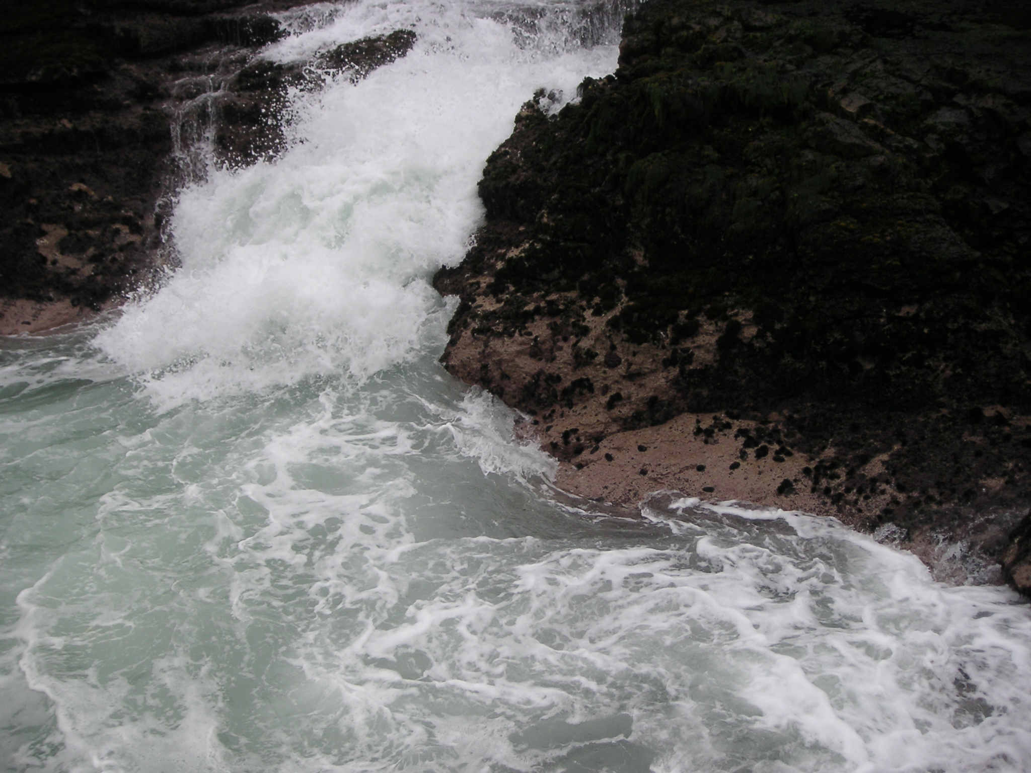 Waves crashing over the rocks at Pucusana.