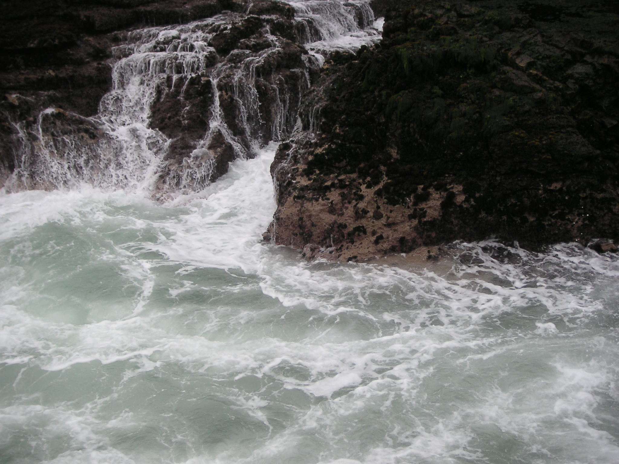 Waves crashing over the rocks at Pucusana.