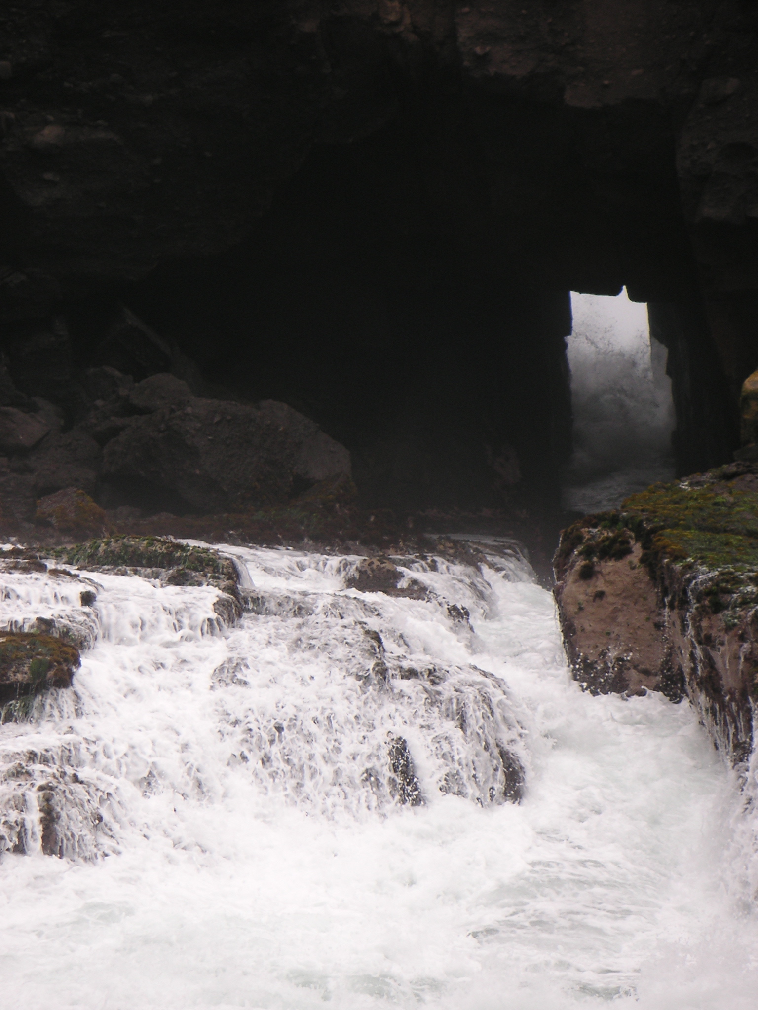 The inlet at Pucusana. Waves come through this small opening and crash over the rocks.