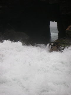 The inlet at Pucusana. Waves come through this small opening and crash over the rocks.