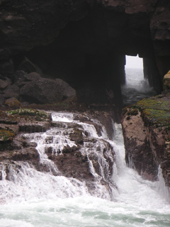 The inlet at Pucusana. Waves come through this small opening and crash over the rocks.