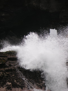 The inlet at Pucusana. Waves come through this small opening and crash over the rocks.