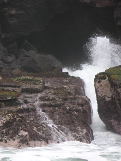 The inlet at Pucusana. Waves come through this small opening and crash over the rocks.